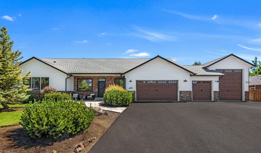 Welcome to your dream home on a 1/2 acre in desirable Northeast Bend! This custom home, built in 2015, boasts 2556 SF of modern retreat living space. Step inside to discover the completely updated interior that blends contemporary style with seamless comfort. A highlight of this property is the expansive backyard, perfect for outdoor gatherings and relaxation. Additionally, it features a rare 34-foot RV garage/shop, providing ample space for all your vehicles and hobbies (*also, double garage door for drive through access 3rd car bay of main garage).Whether you're enjoying the beautifully renovated interior or exploring the vast outdoor space, this home is sure to impress at every turn. Great proximity to schools, parks, shops, and medical. Make it yours today!