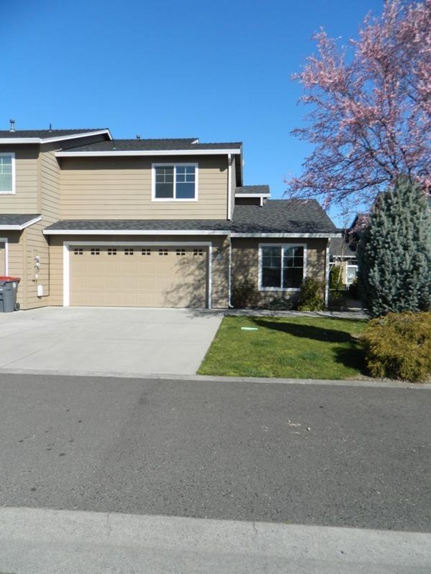 Well developed area. 1230 sqft Two master suites. 3 bedroom 2 1/2 baths. The living room is open to the kitchen. Easy to maintain. Two car garage. This home is vacant and ready to move in.