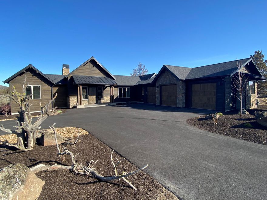 This stunning, NW style new construction single level home offers sweeping views of the Powell Buttes and private nature scape. Beautifully masoned stone accents abound throughout the exterior of this home and flow into the simplistic open plan. The great room and kitchen area are perfect for entertaining, and the handcrafted stone fireplace creates a warmth that resonates throughout the home. The primary bedroom is privately positioned and offers a soaking tub, large thoughtfully tiled shower and a spacious walk-in closet. The large three bay garage provides for ample room for vehicles and toys alike to enjoy all that Central Oregon has to offer. Discover all the Benefits of Membership, Athletic Center with 3 Pools, Water Slide and Lazy River, Cascade Pool (Adult Only Pool), Equestrian Center, 18 Hole Award Winning Golf Course, Spa Brasada, Member Club Room, Restaurants, Hiking, Biking, Fishing, Horse Back Riding and much more!