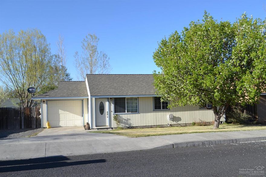 Cute starter home in a nice subdivision. 3 Bedroom/2 Baths, 1008 sq. ft. home with Pergo laminate floors & tile with radiant heating. Upgraded kitchen with stainless steel appliances and granite counter tops. Tiled and upgraded bathrooms. There is a space to park you RV and an 8 x 10 storage shed. The yard is fenced and landscaped with beautiful shade trees and a play structure. Close to the park. A must see!