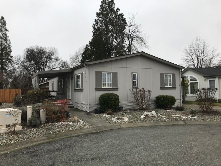 WOW! Well cared for 3 bedroom 2 bath, split floor plan 1995 manufactured home in 55+ Willow Estates North. Great kitchen with lots of cabinetry, counter space and breakfast bar. Wonderful covered front deck for outdoor enjoyment. 3rd bedroom could be second master or great art/craft room with bathroom. Includes all appliances plus washer & dryer. Updates a new heat pump in October 2020 and new roof approx. 4 years ago. Fenced backyard, low maintenance landscaping and a ramp for easier access. End of cul-de-sac location, no thru traffic. Space rent of $600.00 mo.  includes water and sewer. Park approval is required, 1 pet allowed, up to 15 lbs. RV parking may be  available.