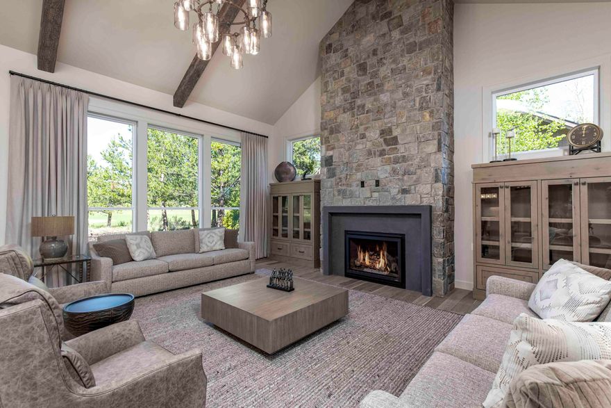 Experience luxurious living in this stunning NW style home in Caldera Springs that boasts a prime golf course frontage and views of Mt Bachelor. This serene property provides the perfect escape from the hustle and bustle of everyday life. With ample gathering spaces, perfect for full time living or a vacation escape. The main level features three spacious on-suite bedrooms, a great room, a gourmet kitchen, a dining area, a laundry/mudroom, a powder bath, and an expansive covered paver patio that's perfect for entertaining. Upstairs, you'll find two more luxurious on-suite bedrooms, as well as a recreation/bunk room that's perfect for kids or guests. This home is beautifully appointed with distressed wood beams, custom cabinetry, rich woods, solid surfaces, designer tile, high-end appliances, and two-zoned central A/C. Now sold furnished, this home is move-in ready.