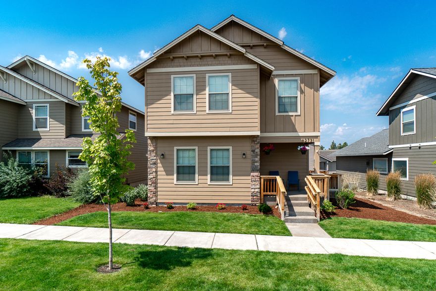 Enjoy living near the heart of Bend in a quiet community in a home that's like new! Covered front entry w/craftsman style stone accents, opens to a spacious great room w/tons of windows. Wood look laminate flooring on main floor, Gas burning fireplace w/modern style surround. Decorative mantel & white wood trimmed windows, 2'' blinds installed. Open kitchen w/island & breakfast bar seating, slab Quartz counter tops & adjoining dining area w/slider out to a bbq patio. Stainless Steel gas range, dishwasher & microwave. Powder bath completes the first floor. Oversized Master Suite offers 2 large walk-in closets, bath has dual sinks & lg vanity.  2 guest bedrooms share a well appointed bath & laundry is upstairs w/bedrooms. Central A/C! Alley access home w/plenty of parking for guests on street. Conveniently located near shopping, medical, restaurants & schools. Easy access to the hwy, recreation & the Redmond airport - Don't miss! Quick close possible.