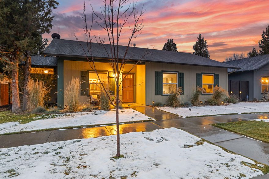 Adorable turn-key single level 2 bed + office (could be converted to 3ʳᵈ bed) home, nestled in an established neighborhood just minutes to the Old Mill, blocks away from schools & Bend's latest attraction Alpenglow Park! This inviting floorplan boasts a gorgeous remodeled kitchen featuring updated cabinetry w/glass doors, quartz counters w/large island breakfast bar, subway backsplash, & ss appliances w/ 5 burner range. A dining room addition is great for entertaining & adds an open feel to the home. Beautiful hardwood floors in the dining room extend through great room into the office that is well appointed for working from home. Updated in 2018 the primary bed & bath feature tile floors, tile shower, dual vanities, updated fixtures, additional cabinetry, & skylight. Step outside into a private landscaped backyard w/ paver patio. The large 2-car garage has ample room for storage & updated electrical for running shop tools. Priced under $520K this is a must-see!