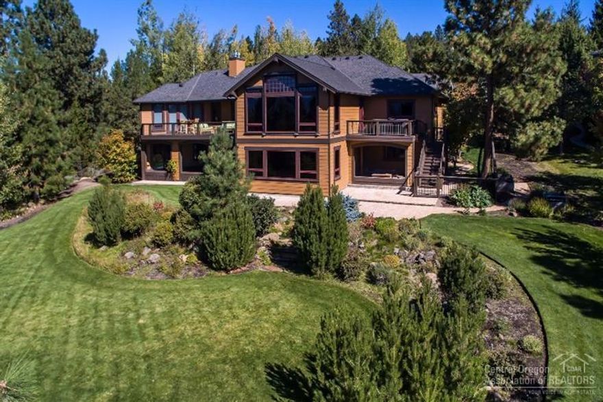 Fabulous high quality home w/full on Cascade Mtn views! Gourmet kitchen features solid slab granite counter tops, island, SS appliances, Viking cooktop-4 burner w/griddle, Sub Zero, dbl Viking ovens, Viking wine refrig. & loads of cabinets. Vaulted LR w/exposed beams & FP w/blt-ins on either side. FR features floor to ceiling windows, FP & blt-ins. Luxurious master w/FP, French doors, slab granite counters, tile floors & stand alone tub. Guest ste upstairs, 2nd master down along w/kitchen & addit. FR.