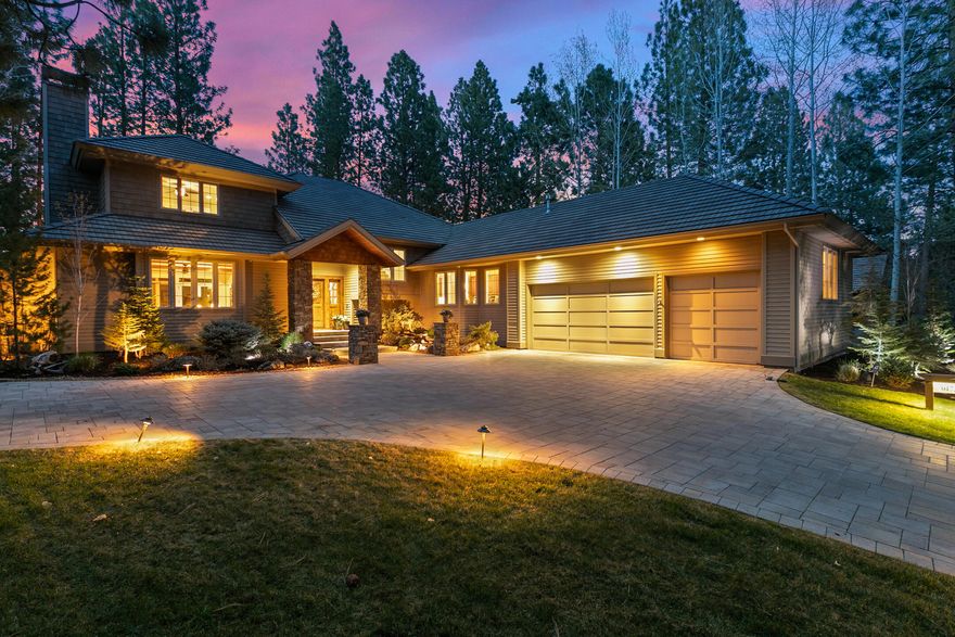 Enjoy luxurious casual living in this gorgeous Broken Top golf course view home.  Welcoming foyer leads to sunny & bright great room with floor-to-ceiling stacked rock wall surrounding the fireplace, box beamed ceilings & expansive windows that flood the interiors with natural light & frame the golf course views that lie beyond lushly landscaped yard. Dining room is ideally positioned for entertaining or quiet meals at home, prepared in gourmet kitchen featuring glazed cabinetry, Wolfe range, breakfast bar, wine refrigerator & solid surface counters. Tranquil main level owner's suite has been expanded to create a sitting area from which to enjoy fairway views & quiet time in front of cozy fireplace. There is also a private & spacious en-suite guest room on main level.  Upstairs family room & balcony provide amazing golf course views, as do two additional guest-suites providing perfect retreat for family & guests. Expansive paver patio for enjoying peaceful setting & golf course views.