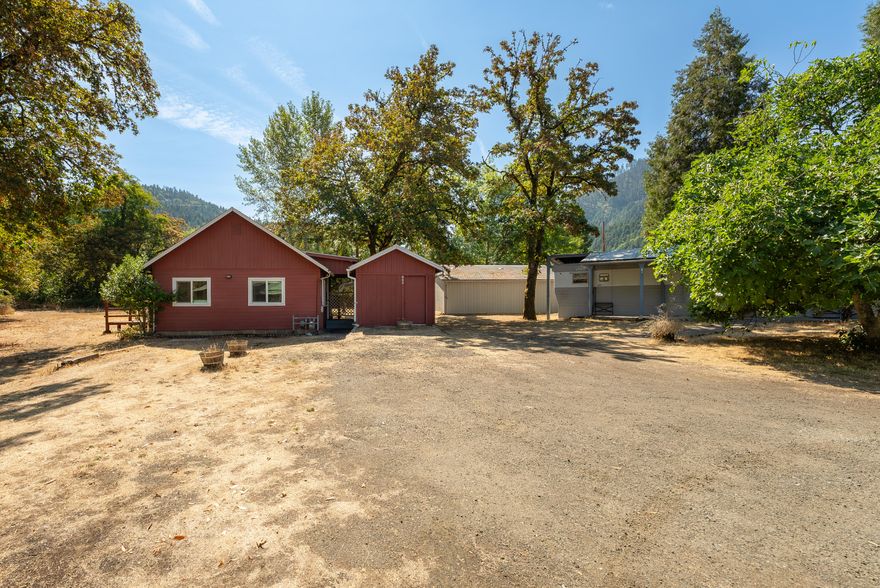 Unique opportunity to own two homes on two adjacent tax lots (.17 acre each) with their own addresses. Perfect for a two family setup or live in one and rent out the other. 255 SE Second is a 800 SF, 2 bedroom, 1 bath home built in 1955. Laminate wood floors and newer vinyl windows. Deck that overlooks a private setting with mountain views. 20x20 carport and 10x10 tool shed. Plenty of room for RV parking/ boat storage. 249 SE Second is a 420 SF 1 bedroom, 1 bath single wide mobile home. Laminate wood floors and updated kitchen. Also on this tax lot is a 720 SF shop built in 1999. Close proximity to I-5 access and Seven Feathers Casino Resort.
