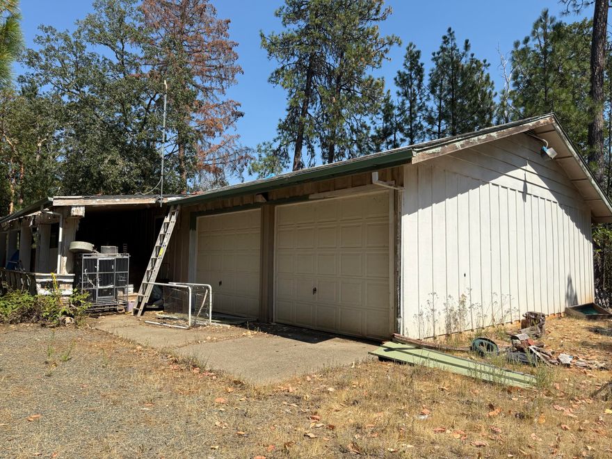 Endless Potential on Over 6 Acres! This 3 bedroom 2 bathroom home with 1,800 sqft offers the perfect blend of space and privacy nestled on a beautiful 6.10 acre lot. The property features an oversized 2 car garage, ideal for extra storage, a workshop, or hobby space. Inside, you'll find a solid layout with room to update and make it your own. Whether you're looking to create a private retreat or start a homestead this property has the flexibility to fit your dream lifestyle. With some TLC this rare piece of land can be transformed into something truly special, don't miss your chance to make it your own!