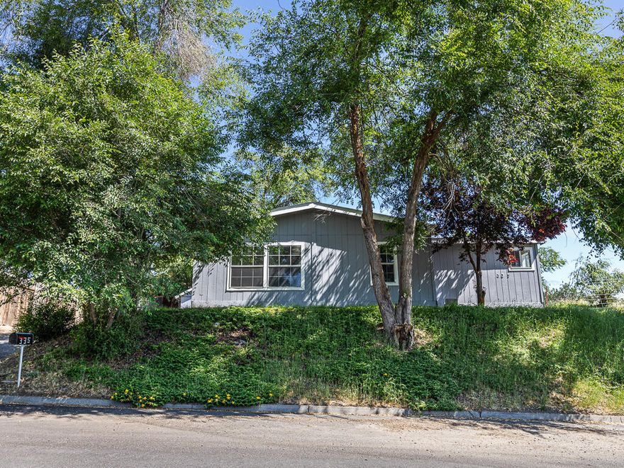 Professional pictures coming. Charming and spacious 1,918 sq ft triple-wide manufactured home on a corner lot! This well-maintained 3-bedroom, 2-bath home features walk-in closets in every bedroom, a large primary suite with a private bath and oversized closet, and brand-new flooring throughout. Fresh interior paint gives the home a clean, modern feel. The open floor plan offers comfortable living with a cozy pellet stove for supplemental heat. Enjoy a generous yard, on and off-street parking, and a storage shed for all your extras. Conveniently located near Oregon Tech and Sky Lakes Medical Center. Move-in ready! Listing agent is related to seller.