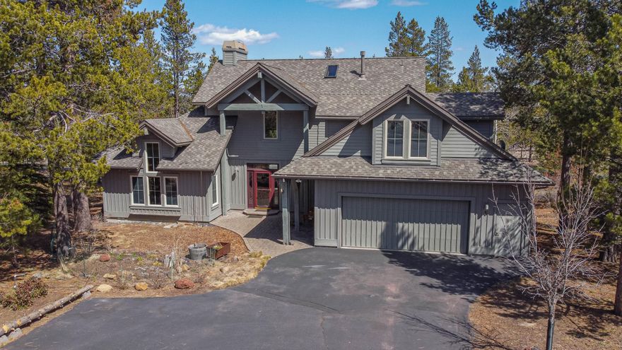 Pride of ownership is absolutely an understatement. This meticulously designed, built, and lovingly maintained custom home from the original owners is apparent the moment one comes through the front door. This home has been a primary residence yet has all the required elements for a successful rental property. Hand hewn local timber beams, locally quarried rock fireplace, 140–160-year-old kitchen floor tiles from Santa Cruz, locally milled eastern hard rock maple floors, solid hemlock interior doors, cabinets made locally of southern hickory, and 1940's glass block shower wall are just some of the many interesting and architectural design features. Great room design with vaulted wood ceilings. Two oversized, comfortable suites with lovely window vault design, spacious walk-in closets, and both with their own bathrooms ensuite on the primary. Loft bedroom up with full bath, and closet. An additional bedroom, with walk- in closet, or imagine a bunk, bonus, or media room.