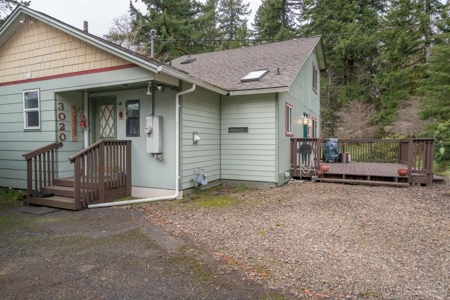 This beautiful home is located in the country but still close to most amenities. It has been lovingly cared for and been remodeled with an updated and modern kitchen, bathrooms and gas stove. The home also features a basement and outside is a good size shop area. There are mature fruit trees, large decks, room for your toys or your RV and so much more!