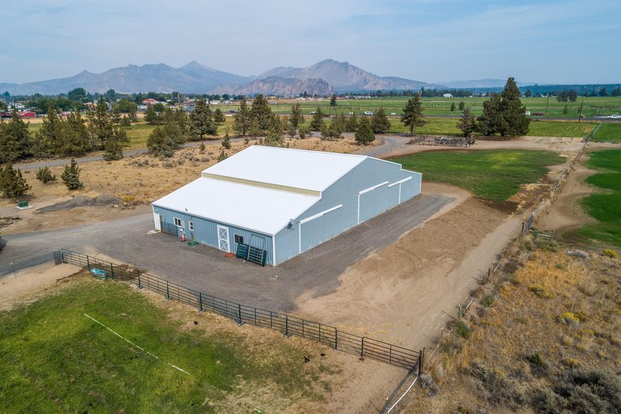 Work & play in beautiful Central Oregon w/views from the Cascades to Smith Rock & beyond. This unique home site is ready to go w/power, septic, private well & temporary living quarters in the nearly 7,000 sf indoor arena/shop. Easy highway access for oversized vehicles & just on the south edge of Terrebonne. Active COID irrigation rights for the flood irrigated pasture - currently planted in orchard grass.  Indoor arena has workable sand flooring, turnout stalls, wash rack & heated living/tack space w/full bath & hot water. Partially fenced & cross fenced for livestock. Home site will have westerly views of the Cascades. Zoned TR5 for single residence. Quick drive to Smith Rock State Park, Lake Billy Chinook, Deschutes & Crooked Rivers & all amenities. Bring your builder & don't miss!!