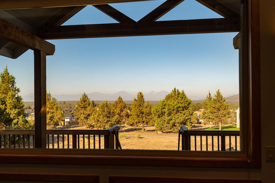 Single level  home with Cascade mountain views, double garage plus detached garage and ADU – on two acres in Redmond city limits!  Large decks on front and back for comfy morning and afternoon outdoor enjoyment.  Home has Corian counters, cherry cabinets, hickory and tile floors, solar hot water, motorized shades for west facing windows, sauna, skylights and solar tubes, and much more.  Landscaping is under auto sprinkler and drip systems.  Home and ADU are served by city sewer and well.  City water is at the street in the event  it is preferred.  Owner has begun process to develop 3 building lots and will provide information if buyer wishes to pursue partition process.