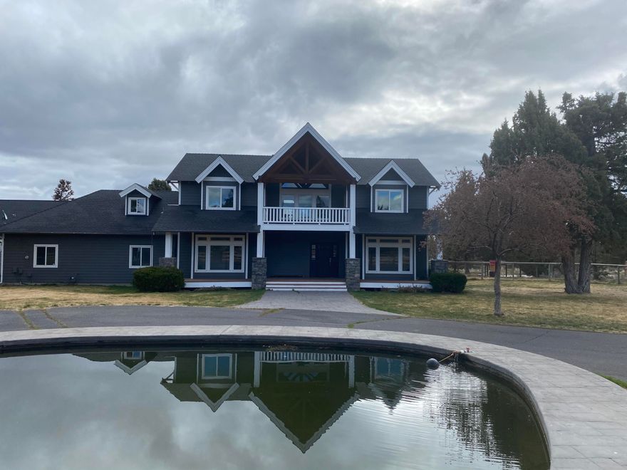 For Comps Only
Do not miss the opportunity to live in the most desired neighborhood in Bend! This urban farm sits on a 2.5 acre lot with 2/5 acres of irrigation water. Live on the canal with views of the mountains! It boasts a pond, horse facilities, chicken coop, RV parking & hookup & large shop! Have the best of both worlds with space and privacy yet walking distance to schools and parks. This large custom built home has lots of storage and bonus spaces for game room, theatre room, playroom, or home gym! This custom home builders personal home features a timber frame entry and tongue& groove pine ceiling, rare juniper hard wood floors, solid wood doors, & pine wood trim & cabinets throughout. It also includes an attached 1 bedroom apartment, with full kitchen, bathroom & separate entrance!