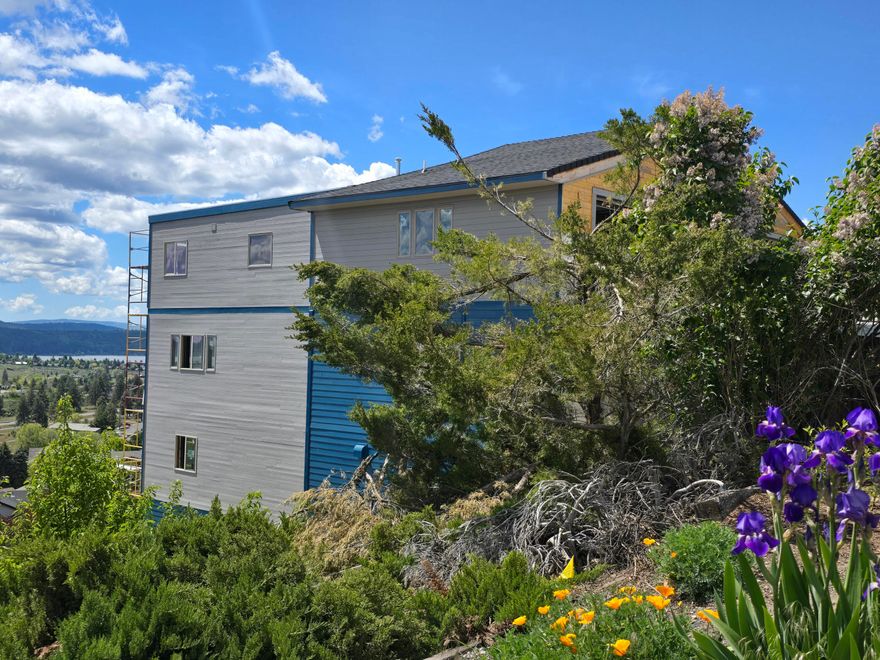 Introducing a stunning new build in the highly sought-after Knob Hill area of Klamath Falls.This exquisite  approx. 3990 sq. ft. home features four spacious all-primary suites, ensuring comfort and privacy for family and guests. With four full baths and an additional half bath, luxury meets functionality in this thoughtfully designed layout. The property includes two separate 384 sq. ft. garages, providing ample parking and storage options. Expansive decks and porches, totaling approximately 520 sq. ft., are perfect for enjoying the beautiful surroundings. The heart of the home features a gorgeous island breakfast bar, ideal for casual dining and entertaining. Conveniently located near the hospital, doctors, shopping, and parks, this home offers easy access to everyday necessities. Nature enthusiasts will love the close proximity to lakes for fishing and hunting, along with scenic trails for outdoor adventures. With breathtaking panoramic mountain views and a great floor plan!