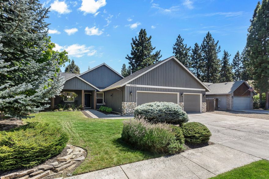 Beautifully updated single-level home in SW Bend! Nestled on a quiet, tree-lined street, this 3-bed, 2-bath home offers 1,500+ sq. ft. of stylish living space. Surrounded by mature trees for shade and privacy, it's a peaceful retreat in one of Bend's most desirable neighborhoods. Inside features an open-concept layout with a bright living area, updated kitchen with newer appliances (2024) and solid surface countertops, plus fresh interior/exterior paint. Enjoy recently installed AC system for year-round comfort. The 3-car garage includes an extra bay with a new motor installed in 2024—ideal for a gym, workshop, or storage. Relax in the private hot tub or entertain in the beautifully landscaped backyard. A spacious side yard offers RV parking or more. Minutes from the Old Mill District, Deschutes River Trail, shops, dining, and outdoor recreation, this move-in-ready home perfectly blends comfort, style, and convenience.