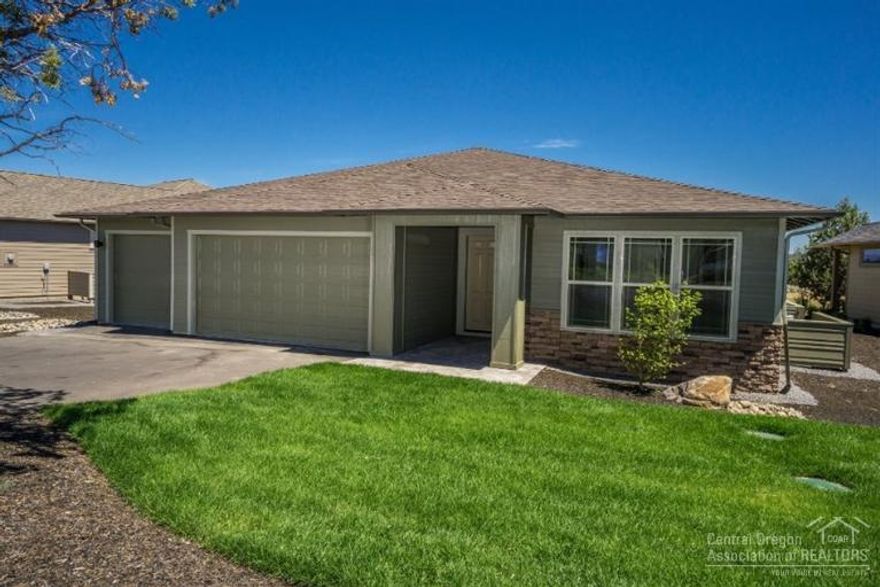 Brand New Home in the Eagle Crest Premier 55+ Active Community - The Falls! Come see this 1998 SF, 3 Bedroom, 2 Bath with Cultured Stone Accents on Front! Large Master Suite, Tiled Master Bath, Walk in Closet, Great Room with Fireplace, Wood Floors in Kitchen and Dining, Alder Cabinets, Raised Bar on Island in Kitchen, Covered Patio, Landscaped Front and Back with Sprinkler System. Enjoy all the benefits of 3 Golf Courses, 3 Sports Centers, Restaurants, Hiking, Biking, Horseback Riding and much more!