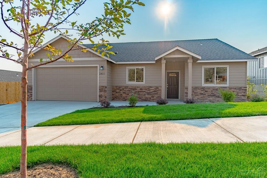 Enjoy 1615 sf of open living space w/vaulted Great Room. Engineered flooring in common spaces, GR features gas burning fireplace w/mantle. Home is light & bright w/all the upgrades built in. Quartz slab counters, all SS Energy Star appliances, custom cabinetry. Gas forced air w/high efficiency furnace & A/C. Dbl car garage w/ covered front and back porches. Completely landscaped w/sprinklers & fully fenced. North easterly views to Smith Rock & beyond, easy access to the hwy, airport or amenities.