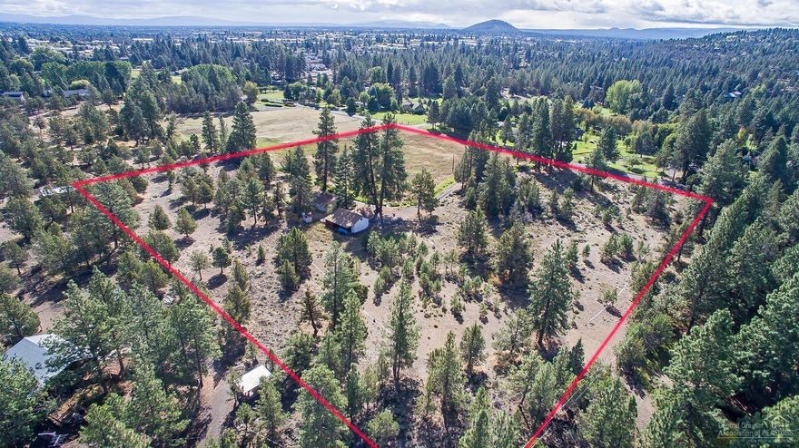 3 Family Compound? 1,2 or 3 Buildable Lots? Look at the versatility! This 9.41 acre parcel is comprised of 3 legal lots of record. All are potentially buildable NOW (subject to septic feasibility, lot line adjustment and usual permits from county). Or there could be two homes built on 4+ acre mini-estate parcels. Please confirm all info with Deschutes County. This is an exceptionally fine area of small irrigated acreage properties, very close to city limits and all services, but with a distinct rural flavor. Riley Ranch Nature Preserve Park is at the end of Glen Vista Rd., and the newest elementary school, North Star Elementary, is just up O.B. Riley Rd. The older house on the property is functional and livable, and there's a nice size garage.