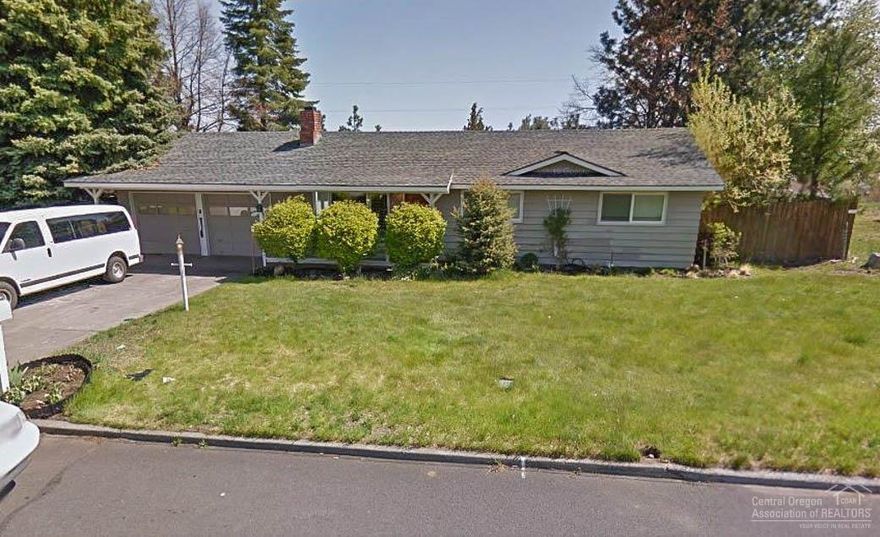 High potential fixer upper with an unbeatable Hilltop location. This Home has great bones on a .37-acre city lot, across from Dutch Stover Park. Exceptional Privacy in the heart of NE Bend. Walking distance to all Schools, sweeping easterly views, large deck, yard with sprinkler system, and a 2-car garage with shop area. Builders note: possible subdivide potential for lot. Remodel and enjoy.