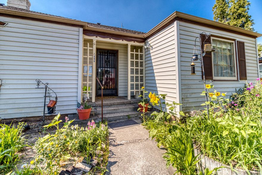 1941 Classic single level home on large lot with basement. 3 Bedrooms and 2 Baths, one of the rooms is small and used as an office. Wood burning fireplace in the Livingroom. Breakfast nook in kitchen. Living room and dining area can be separated with sliding floor to ceiling shutters. Lots of storage with display shelving and built-in cabinets. Working windows were recently replaced, Bay windows are original. Front yard is beautifully landscaped, concrete patio at back of house with a lower back yard and 2 storage sheds. 2 car garage faces the alley. Entrance to basement from garage level or stairs down from kitchen.