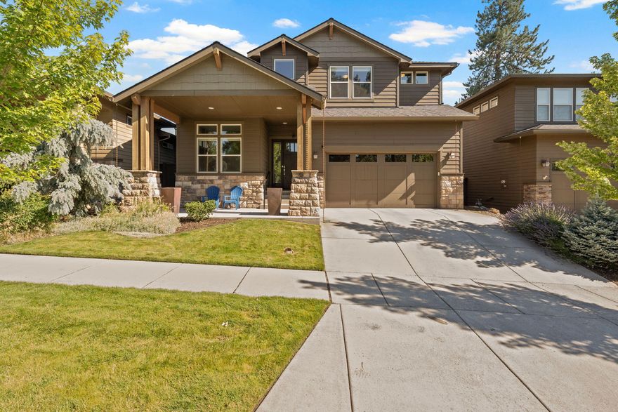 Two Primary Bedrooms. Don't miss the value in this stunning five bedroom SW Bend home with private downstairs office and spacious upstairs loft. Located directly across the street from Aspen Rim's coveted ''Central Park'', which includes a private community pool, covered pavilion with fireplace and wonderful playground. There is additional community common space behind the subject property for added privacy. This home features two spacious primary suites, one downstairs and the other upstairs with the additional three guest bedrooms. The central loft upstairs is a great place to read a book, watch a movie or let the kiddos play. Private office at the downstairs entry boasts glass French doors and beautiful white wainscoting. Oversized 2-car garage, zoned heating/cooling, quartz countertops throughout, built-in speakers and more. HOA covers front yard landscaping. Just a few blocks away from Deschutes river trail access.