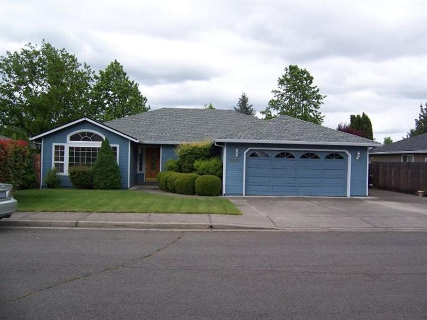 Great location in the Lone Pine School District! Well maintained 3 bedroom/2 bath home on a quiet cul-de-sac with views of Roxy Anne. This home has an open floor plan with vaulted ceilings in the Living Room & Family Room and lots of light. Hardwood entry, nice kitchen with tile floors and stainless steel appliances. Completely remodeled bathrooms with Travertine tile floors, granite counter tops and custom tiled tub surround and master bath shower. New roof in 2013, new exterior paint in 2010. Private back yard with mature landscaping and large open deck, great for entertaining. 2-car attached garage and concrete RV parking.