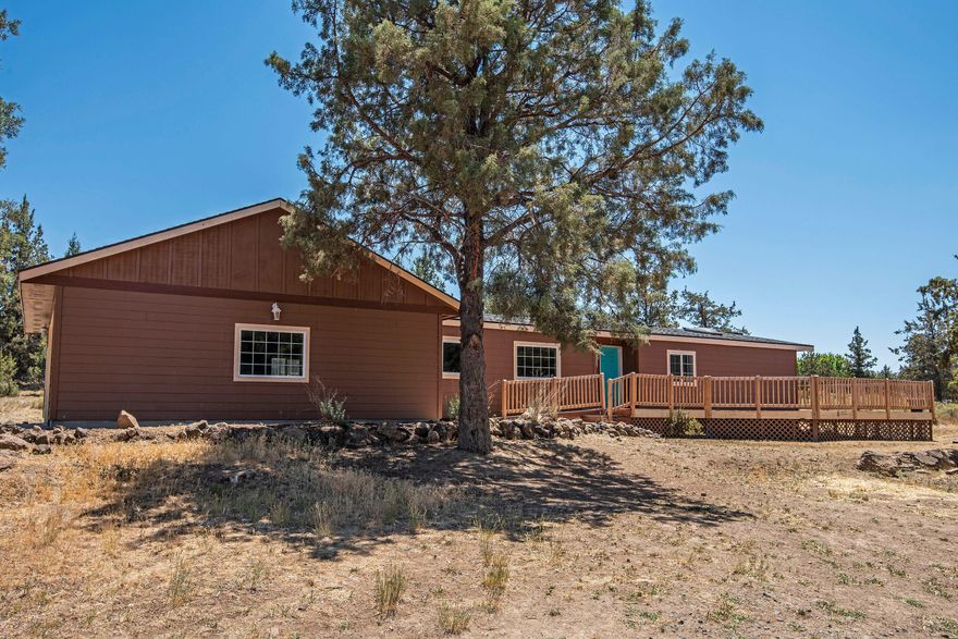 This charming home has so much to offer. Inviting floor plan with open concept in the heart of the home. Large kitchen with ample storage and large island, w/newer wood-lam flooring throughout kitchen and dining area, vaulted ceilings makes for a spacious feel. Huge deck with brand new deck railing in 2019 is perfectly situated to view the 1.08 acre property. The over-sized 2+ car garage would make for a perfect shop for all the toys! Crooked River Ranch offers great owner amenities that include pool, tennis/pickle ball courts and disc golf. CRR also has a top ranked golf course! Enjoy the great outdoors w/close proximity to hiking trails, fishing, boating, skiing, rock climbing, equestrian trails and parks!