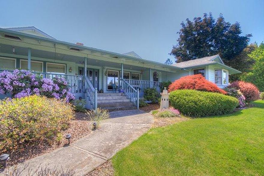 You can have it all! Sprawling 3148 square foot ranch home offers a beautiful panoramic view of the valley from this elevated knoll. But wait there's more city schools, irrigated pasture AND a shop plus a barn. One owner home has been meticulously cared for and is framed by three acres of green pastures and white fencing. Spacious three bedroom/2.5 bath home features formal and informal space for quiet evenings by the fire or entertaining large groups. Beautiful custom built-ins in the living room and a wood burning fireplace back-to-back with a pellet stove keeps you warm and toasty. Storage is abundant here, not just in the kitchen but tucked under window seats and everywhere you look. Plenty of room to park at least a half dozen vehicles, a finished shop and an RV port with all the hookups plus a barn with stalls. But the best part is sitting on the front porch, soaking in the view.