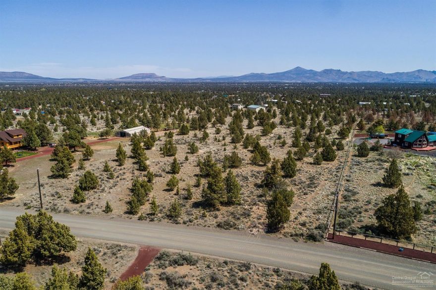 360 degree views possible from this buildable lot on one of the highest points in Crooked River Ranch - wow! The Cascade Mountains to the west and Smith Rocks to the east provide all day spectacular views. Build your dream home & use it for vacations until you can retire on this peaceful spot. Room for a barn, shop, or hobby building of any kind, you could have horses & ride from your home. Crooked River Ranch amenities include a golf course, pool, tennis, pickle ball & more !