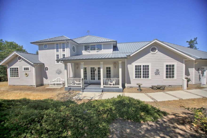 Light, bright and spacious ~ this home has it all! Beautiful craftsmanship with abundant attention to the details. It boasts pretty crown molding, coffered ceilings, wood floors with tile inlay, gourmet kitchen, hobby room and game room equipped with a custom wet bar. This home is an entertainers delight! Home has low maintenance yard, is gated and located at the end of a cul de sac street which offers privacy and security. Call today for your exclusive viewing.