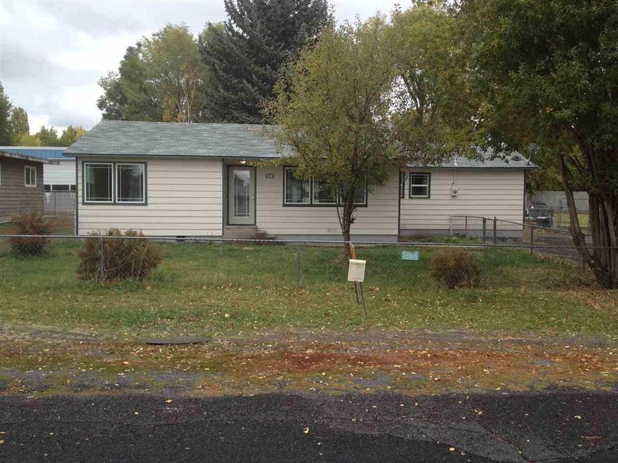 Remodeled Just Now. New And Fresh For This 3 Bedroom 2 Bath Home On A Fenced .23 Acre Lot With A Detached 2 Car Garage. Beautiful New Cabinets. Flooring, Bathrooms, Carpet, Windows Interior And Exterior Paint. Large Utility Building Attached To Two Car Garage. Lot Has The Driveway On Left Side Of Home Also. Chain Link Fence Is Boundary Line.