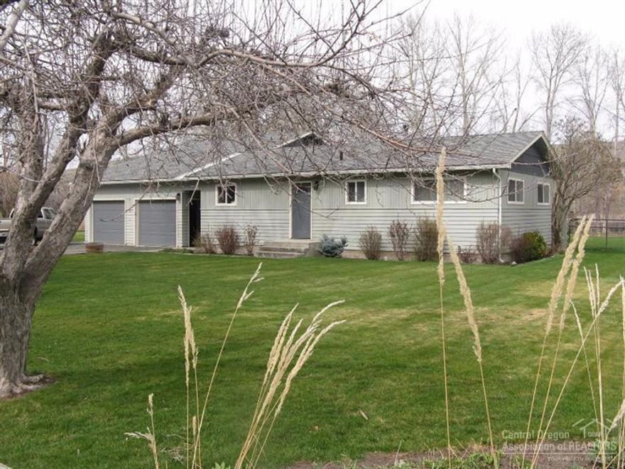 Family Home On .54 Of An Acre On The John Day River! Upgrades throughout this 2 story, 3 bedroom, 2 bath, 1581 sq ft home, family room, 2 types of heat, view windows, vaulted ceiling, tile, laminate and carpet flooring, patio, landscaped, shade trees, garden area, fruit trees, grape arbor, 2 car garage w/utility area, food cellar, shop & lots of storage. $235,000 #827