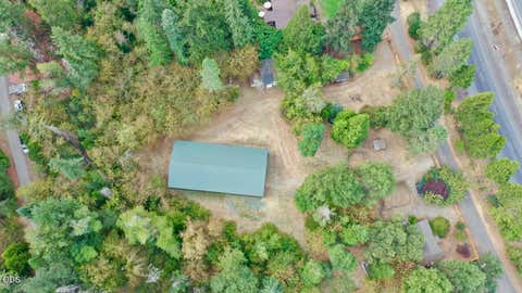 Tiny photo for 122 Sunny Valley Loop, Wolf Creek, OR 97497 (MLS # 220227492)