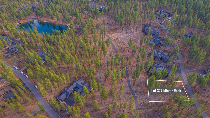 Stunning level homesite in the sought after Mirror Rock neighborhood of Caldera Springs! Lot 379 backs to open space with picturesque views of Ponderosa trees and is just steps to Mirror Rock Lake and Discovery Park. Framed by towering pines and basking in year-round sun, this spacious .40 acre homesite provides the perfect setting to design and build your custom dream home. Owners enjoy special access to the Forest House Amenity & Aquatic Center along with golf, fitness, pickle ball, tennis, pools, lakes, kayaks & paddle boards. Dine year round at the Lake House, ride the miles of bike paths, and meet your neighors at owner events. Caldera Springs is located near Sunriver, just 15 minutes to Bend and 30 minutes to world class skiing at Mt. Bachelor.