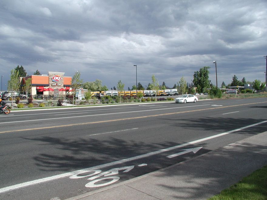 Prime and rare 1.2 acre retail site at the north end of Bend with highway exposure and access to both Hwy 97 and Hwy 20. This is a high traffic location with a thriving retail enclave including Sonic, DQ, and the Empire Car Wash. Property is zoned CG - General Commercial - which allows many uses. City services are available at site.