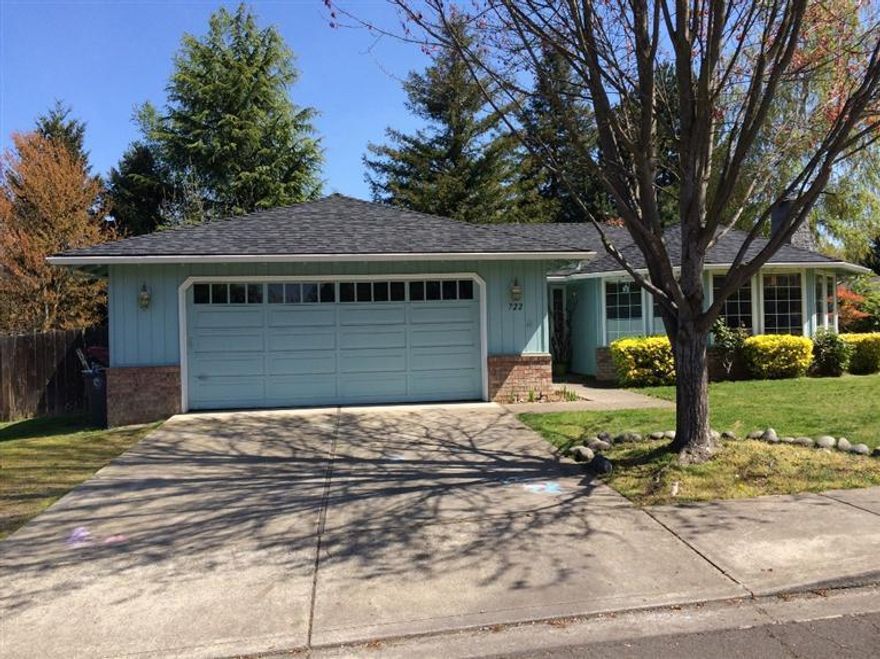 Wonderful location... Very quite neighborhood! Home has a nice large living area, w/wonderful bay window, and a beautiful brick hearth fireplace. Oak floors in kitchen, dining and entry, King sized master bedroom with walk-in closet, and the other 2 bedrooms are nicely sized. Large corner lot, fenced, sprinkles, landscaped & the back yard has an easterly exposure which is great for a summers eve or a morning cup of joe!