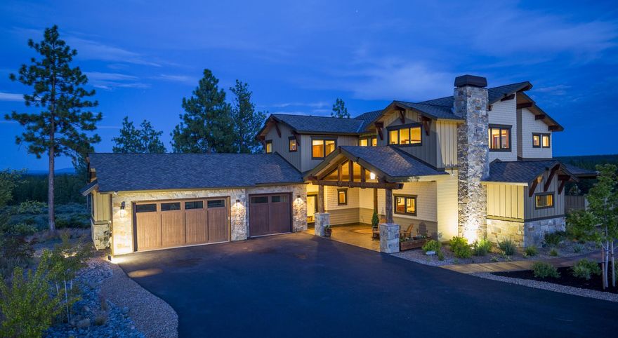 This refined craftsman home on 2 AC in Tree Farm delivers a lifestyle that is both traditional and contemporary. Built by Kaiser Home Builders, this home offers privacy and views from every angle. Living room features built-in walnut cabinetry that extends the length of one wall. Along the living & dining areas, a wall of windows and sliding doors frame the mountain and Pilot Butte views. Kitchen features JennAir applcs, thick fantasy brown granite countertops, a walnut
breakfast bar, & coffered ceilings. A bedroom, bath, office, and cozy den w/ gas fireplace and walnut features are also on this level. Upstairs, find the Master suite, which offers incredible Mt Bachelor views and a large w/i closet & master bath. Two guest bedrooms, a bathroom, and a large bonus room round out this level. Outside, two separate stamped concrete patios are perfect for dining and entertaining. Home includes three-car garage w/ coated floors, indoor fire
sprinklers, hydronic in-floor heating, & more.