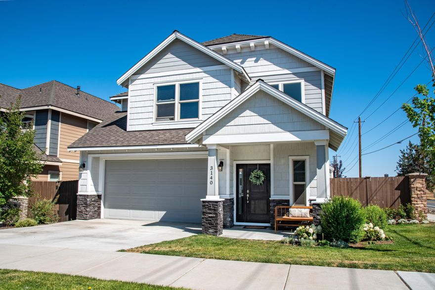 Eastside Bend living at it's finest! Check out this like new home on a rare corner lot in desirable Mirada neighborhood. The open kitchen layout is perfect for entertaining, complete with quartz counter tops, custom backsplash tile, stainless steel appliances and a beautiful island facing the stone surround fireplace. Enjoy the covered backyard patio and fully fenced backyard with established landscaping & dog run. Upstairs you will find a primary suite with vaulted ceilings, a soaking tub, custom tile shower, large walk in closest, two additional bedrooms, an additional bathroom and the laundry room. This home won't last long...schedule a showing today!