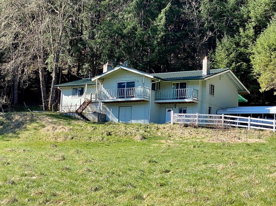 Looking for a home with privacy and usable EFU farm ground with irrigation off a year-round creek? You have found it! Bring your livestock and live on your dream property. Come and enjoy the abundant wildlife, views of the mountains, with peace and quiet on 18 acres backed by BLM. The property is bisected by the West Fork of E. Evans Creek with plenty of free water for irrigating two productive pastures and the large fenced garden area. The 3130 sqft home features a great room style living room open to the kitchen and formal dining room. Three large bedrooms with two full baths. Large laundry plus a workshop area. Updates include a new metal roof and fully remodeled master bathroom. The 420 ft deep well produces 9.62 gallons per minute per well logs. The certified wood insert stove was installed five years ago and there are plenty of trees in your own woodlot to keep you snug by the fire. There is even a barn and large chicken coup. You don't want to miss out on this property.