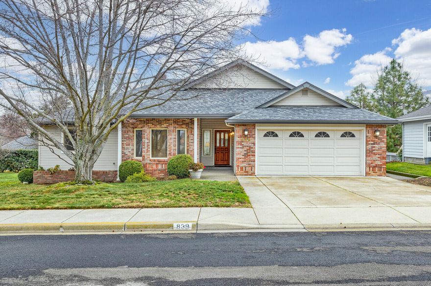 Enter into this single level in Oak Knoll Meadows and you'll find a beautiful, well cared for home with pride of ownership. The home was tastefully remodeled in 2012 with the addition of wood floors, carpet and updates to the kitchen and bathrooms. The living room boasts vaulted ceilings and a gas fireplace with a floor to ceiling natural stone surround. Views of the Cascades can be enjoyed from many parts of the home. There is both a more formal dining area off the living room plus a casual eating area off the kitchen with tons of built-in cabinetry. Tile backsplash brings the spaces together. On the opposite wing, you'll find the three bedrooms, one of which is used as a study and features beautiful glass paned solid wood doors. The primary suite is oversized and has beautiful views plus easy access to the back deck. There is a gracious covered eating area on the deck allowing you to take in the beautiful views that overlook the paths of the common space and the mountains beyond!