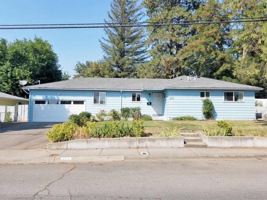 Comfortable home in the quiet NE part of Grants Pass.  3bd, 2bath, 1636 SF on .19 acres.  Many updates to the house within the last four years:  new roof, double paned vinyl windows, gas range, dishwasher, garbage disposal, kitchen floor, front door, all interior doors, garage door, garage door opener and more.  House has large living room with certified wood stove insert and a separate family room that leads to the nice sized fenced backyard. Large bedrooms. Extra large, attached garage and wide driveway for off-street parking. Hardwood floors throughout.