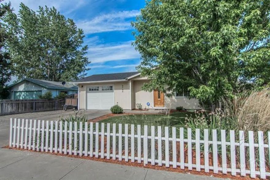 Charming turn-key home in a quiet established neighborhood. Updated and ready for you, with newer roof, paint, carpet, windows, plumbing fixtures & bamboo floors. This home has it all. New heat pump, finished & insulated garage with custom shelving & workbench. Out back you will find a planted garden in raised beds, a wood shed, a chicken coop and more.