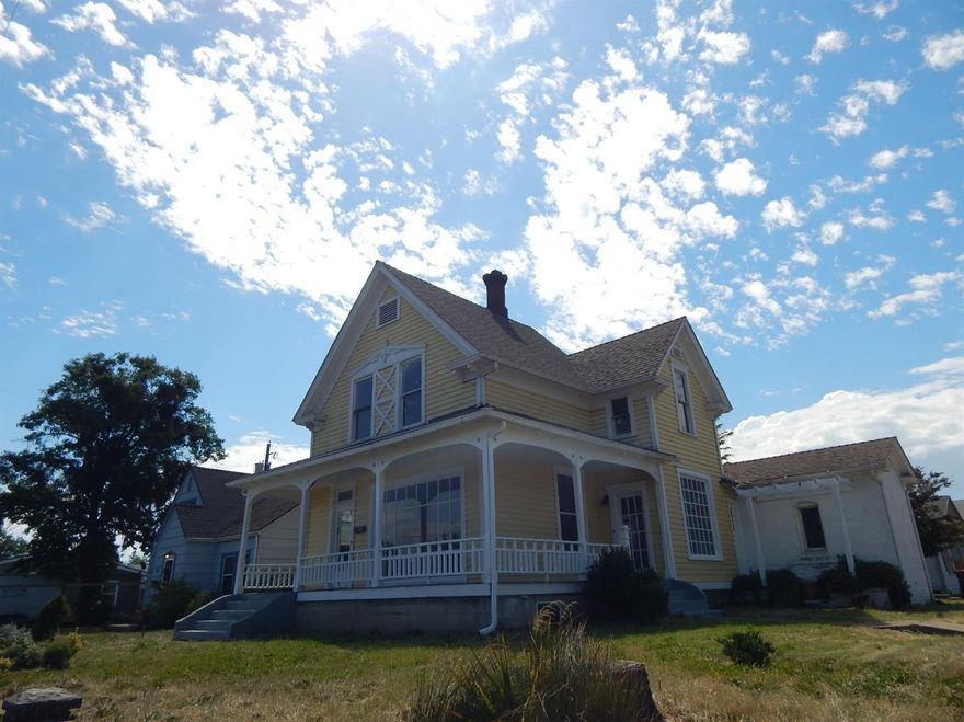 This gorgeous home exudes historic character and charm. Large windows in the living room and formal dining room allow for an abundance of natural light. The home boasts beautiful hardwood floors. This one-of-a-kind property features a lovely wrap-around porch. Ornate molding adorns the windows and doors. A spacious kitchen provides plenty of cabinet and counter space. Washer/dryer hookups are situated in the mud room off the kitchen. Listing agent is related to selling company's manager.