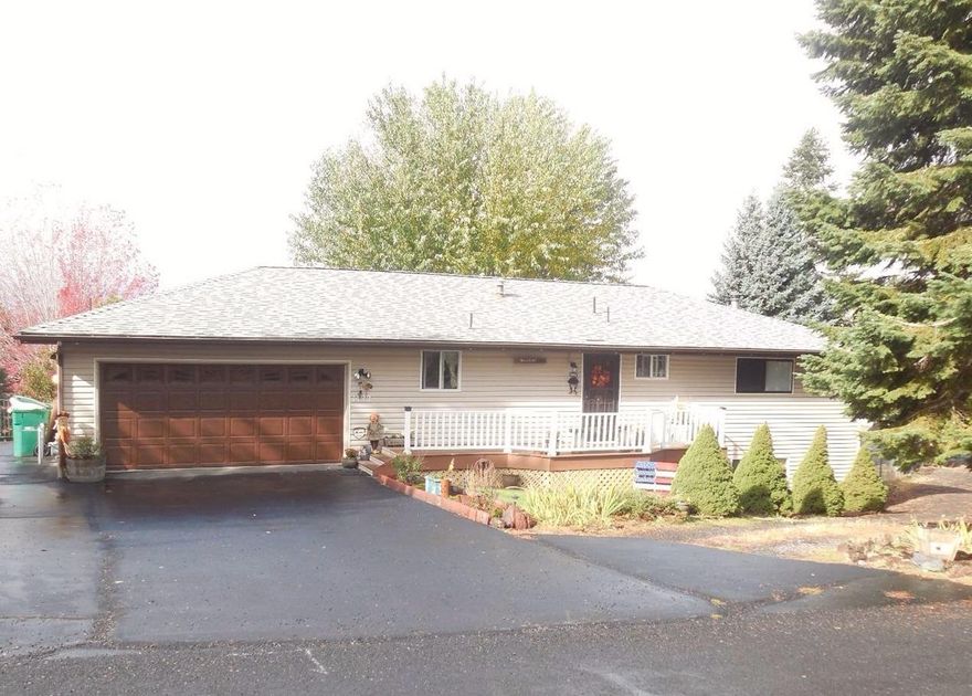 Absolutely Great 4 Bdrm 2 1/2 Bath Spacious Home Has living room and family room plus large dining area off kitchen. Lots of light from western side windows. Roomy family room area downstairs plus 3 bedrooms and bath. Master w bath on main floor, as are the living dining, kitchen and 1/2 bath and laundry. Nice deck off living/dining rm with access to backyard. Lots of parking for RV and cars plus 2 car garage. Circle drive in front.