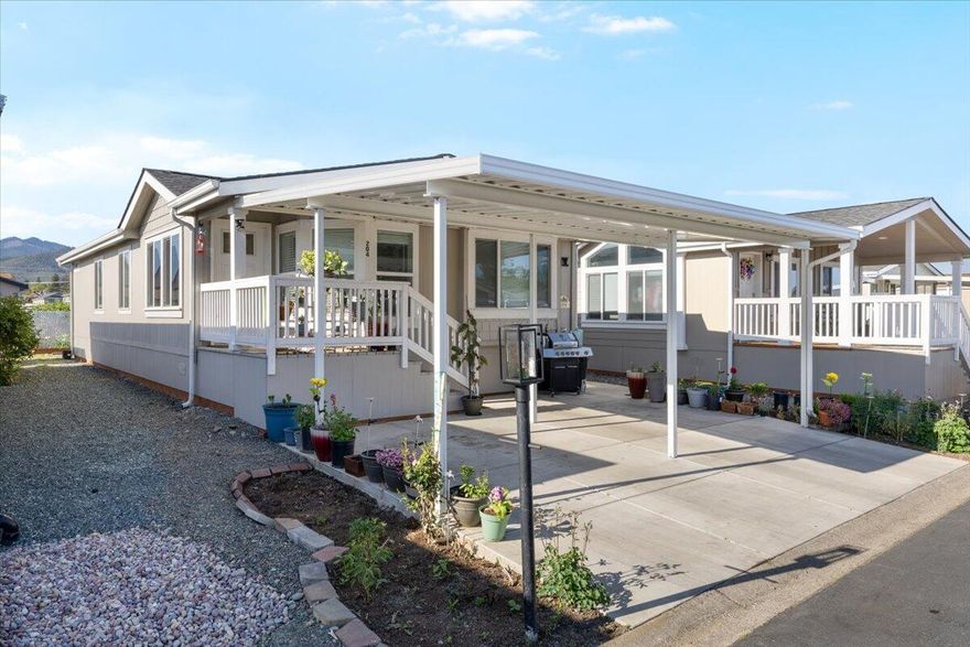 Step into this charming 3-bedroom, 2-bathroom move-in-ready home! This home offers new laminate flooring throughout, an open light-filled layout, this home feels both modern and welcoming from the moment you enter. Enjoy the natural lighting through the multiple windows in the kitchen and living space! Outside offers easy maintenance and a raised garden bed and a storage shed. The park itself offers tons of amenities such as a new clubhouse, pool, spa, gym, and lots more! Schedule your showing today!