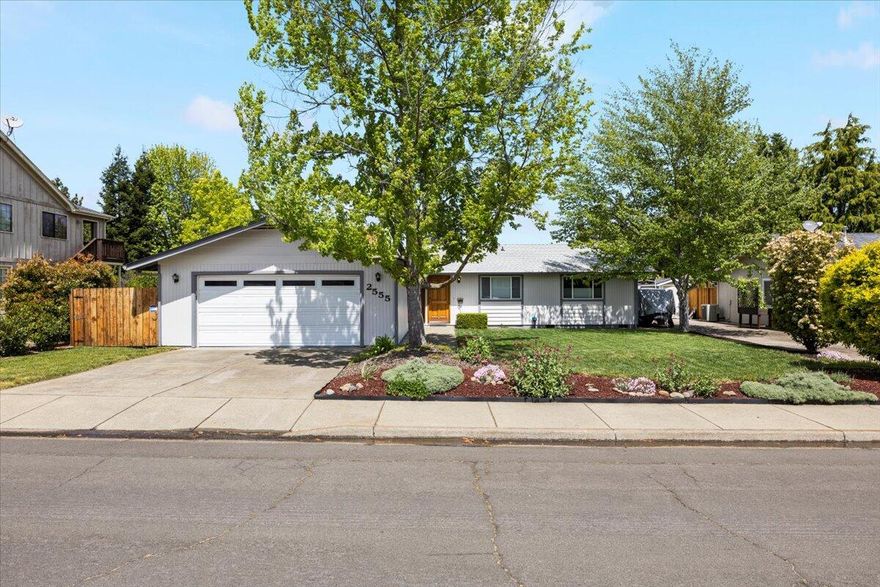Conveniently situated in East Medford, this home is close to Lone Pine Elementary, North Medford High schools and shopping. This well-maintained 4-bedroom 2 bath home, with a recently installed roof, is ready for you to move in. It boasts 2 living spaces with dual gas fireplaces, wooden beams, and sunlit windows overlooking the backyard, creating a cozy atmosphere perfect for relaxation or remote work. The roomy primary bedroom comes with an ensuite bathroom. Enjoy the Southern Oregon sun on the deck or use the electric retractable awning for shade. The .19-acre lot offers plenty of space for gardening and entertaining and complete with a 8x16 shed for storage.