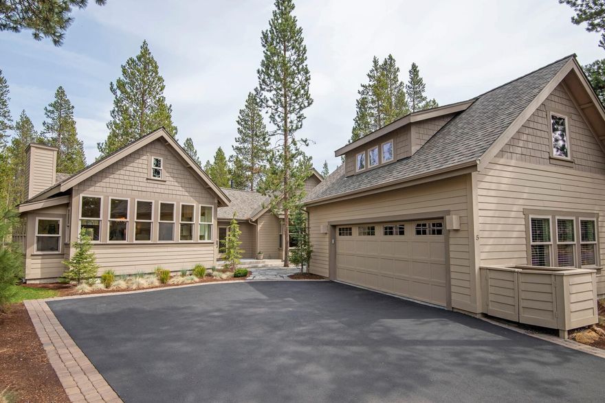 Single level custom cottage, tucked away on a quiet cul-de-sac, backs to open common area with bike path access. Approaching the home, you pass through a private courtyard and into a generous foyer with forest views. The great room design enjoys vaulted ceilings, built-in shelving, wrapped wall-of-windows along both the kitchen and dining alcove, gas fireplace, and a spacious kitchen with numerous custom touches including pull up mixer stand, pull out pantry, and dual fuel range. The primary bedroom has direct access to the large rear deck and is adjacent to a functional office with built-in shelving and desk. Primary bathroom includes walk-in shower, soaking tub and a large walk-in closet with custom closet package. Two guest bedrooms, one with built-in murphy bed, both with bed-sized window seats. Over the garage you will find an additional bedroom + full bath, a perfect mother-in-law apartment or light filled creative space. Character, style and quality in an ideal setting.
