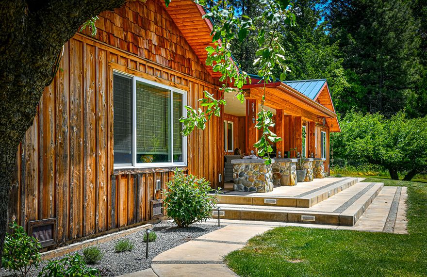 Applegate Farm on 47+ Acres! Beautiful views from the covered deck of this completely remodeled, 3bd, 4bth home. Knotty Alder cabinets w/ granite countertops, Hickory wood floors, stainless steel appliances including Bosch ovens & gas stovetop. The detached, 2 bd guest quarters has also been updated and makes for a pleasant guest or extra family arrangement. Plenty of room for gardens, animals & projects. Pasture w/ approximately 600 ft. of Applegate River frontage. Private woods behind the homes. Great central Applegate Valley location.