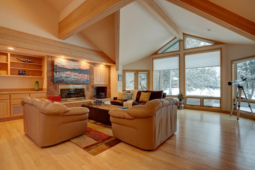 Location! Location! Location! Step inside this custom 3,117 sq foot single level home & immediately enjoy the incredible panoramic views of the 8th Fairway & pond of the Woodlands Golf Course. Thoughtfully laid out with the main master bedroom and a second junior suite on one side of the home with two additional bedrooms on the guest wing. Floor to ceiling windows throughout, bring nature & its beauty inside. Gourmet kitchen that will certainly delight any Chef and their guests.  Slab granite counters, Viking commercial grade gas range w/ 2 ovens & Thermador oven w/ warming oven.  Sub-Zero refrigerator with two additional refrigeration drawers. The great room offers a stone wood burning fireplace. Vaulted ceilings, beautiful hardwood flooring, 1,100 sq ft of expansive decking with hot tub, high-end quality finishes throughout. Built-in desk in kitchen & sink in the laundry room. Oversized two car garage with storage. Paver driveway & entry. Landscaped. SHARC Paid